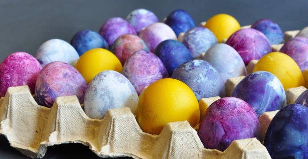 istock Easter eggs. Organized in a cardboard egg tray. Colorful, bright, handmade, decorated 2194952226