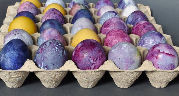 istock Easter eggs. Organized in a cardboard egg tray. Colorful, bright, handmade, decorated 2194952227