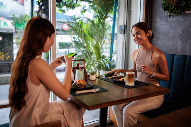 istock Thai Women Having Breakfast in cafe 2194952997