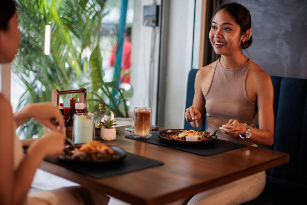 istock Thai Women Having Breakfast in Cafe 2194953065