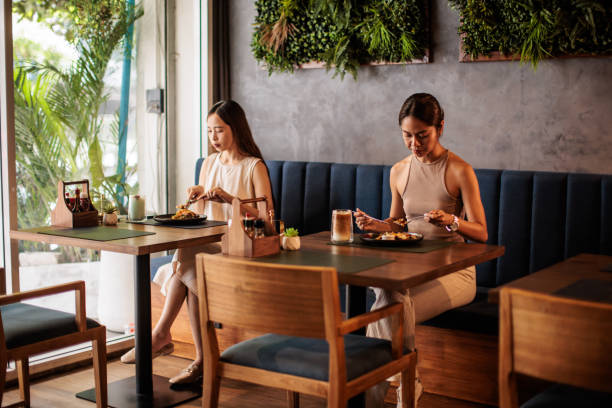 Thai Women Having Lunch in Restaurant