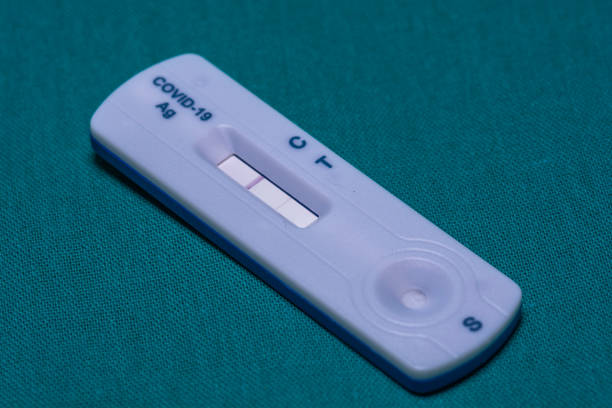 istock COVID-19 rapid antigen test with positive result 2194964477