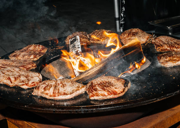 istock BBQ on an open fire juicy beef steaks 2194967586