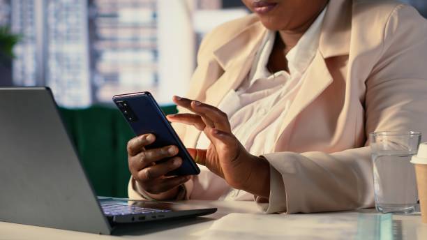 istock Black entrepreneur discussing about updates or business ideas with her staff 2194967940