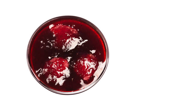 istock jam in glass bowl top view isolated on white background 2194970116