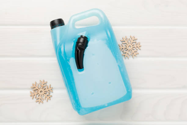istock Can with antifreeze on wooden background, top view 2194972650