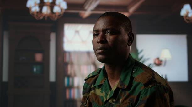 istock Armed forces trooper deals with depersonalization syndrome due to combat PTSD 2194979107