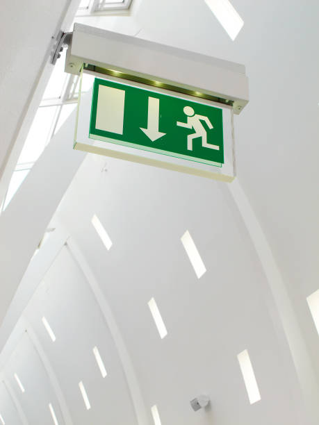 istock Modern emergency exit sign located inside a building in Majorca, Spain, with minimalist architectural designs 2194981570