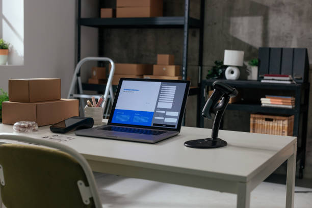 istock Modern home office with laptop and parcels 2194981772