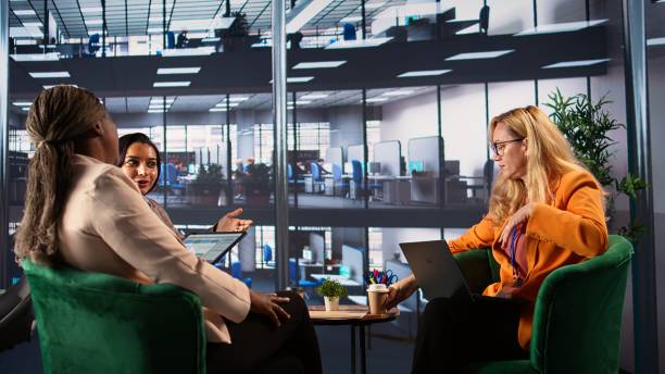 istock Woman CEO dealing with headache from burnout in a modern office space 2194985316