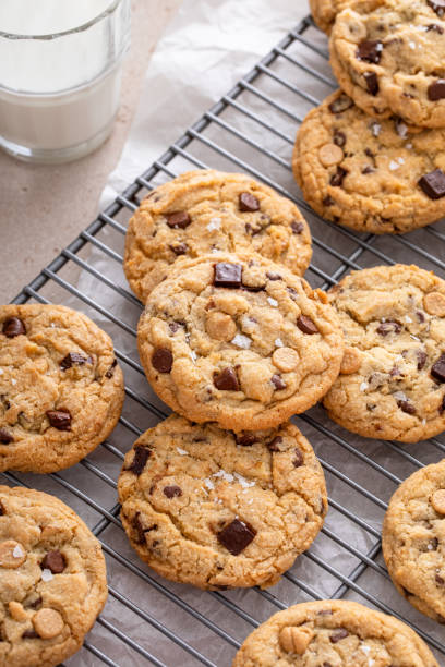 istock Fresh baked chocolate chip cookies on cooling rack 2194993593