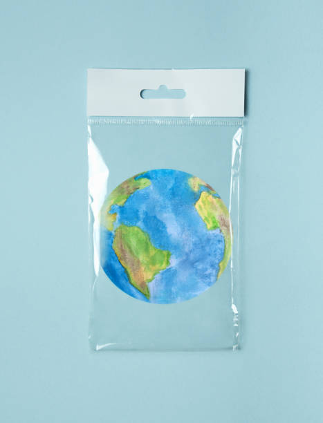 istock Environmental protection concept. Earth in a package on a blue background. Earth Day. 2194994021