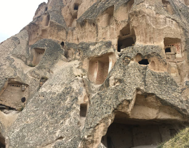 istock Rock formations with ancient homes carved into Cappadocia mountain 2194994229
