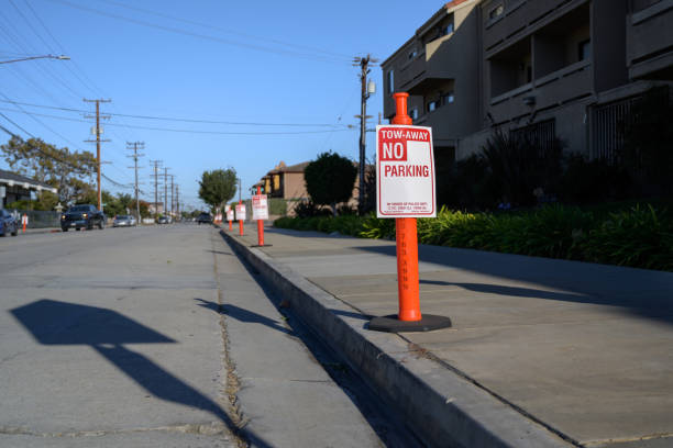 istock Temporary red and white no parking signs 2194995626
