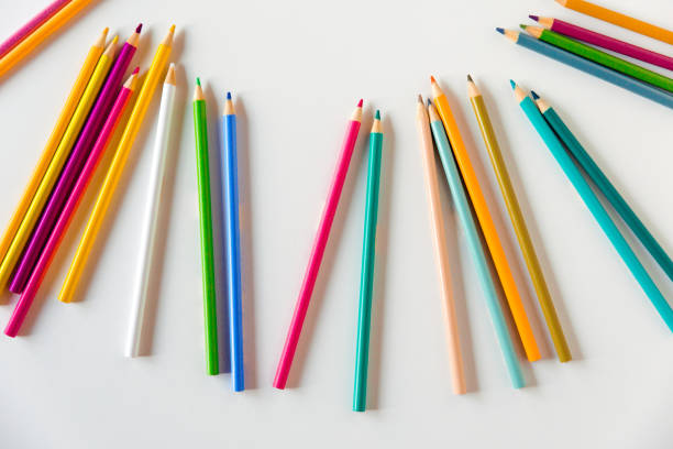 istock olored pencils on a white background. Copy space, mockup, flat lay. Art, creativity, education concept 2194997101