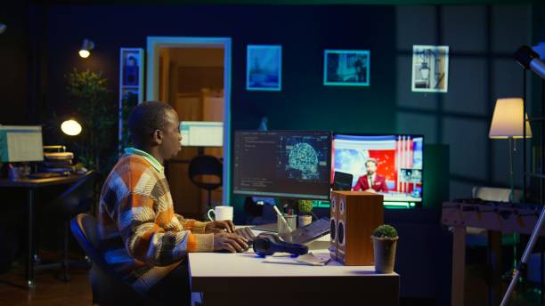 istock Professional male developer manages neural network at desk 2195008638