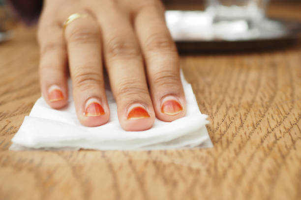 istock person hand cleaning table with cloth 2195011177