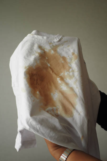 istock spilled coffee on a white shirt 2195011572