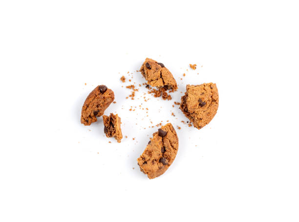 istock Chocolate chips cookies isolated, broken American biscuits, cocoa cake, sweet morsels bakery 2195017037