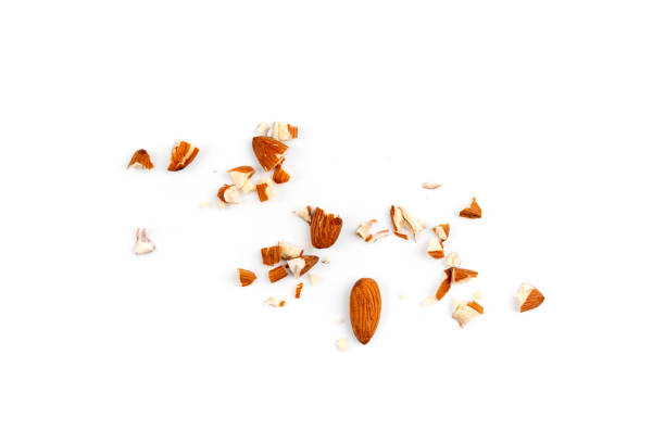 istock Crushed almonds isolated, nut pieces, sliced scattered almond seeds and cut kernels collection on white background 2195017647