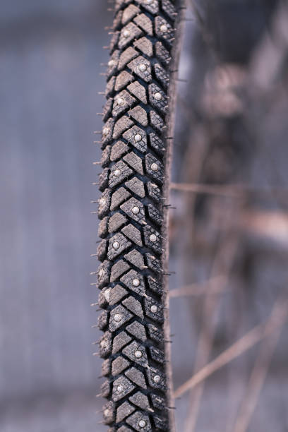 Winter tires with spikes on a bike