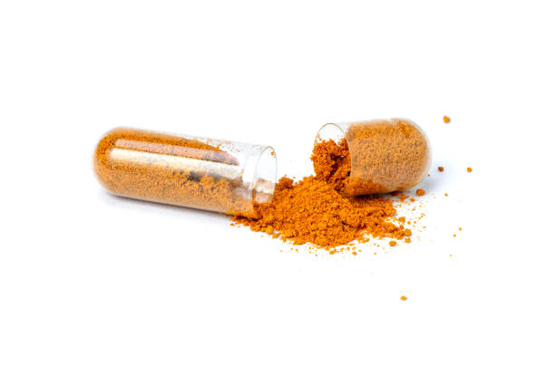 istock turmeric herbal powder capsule 2195023709