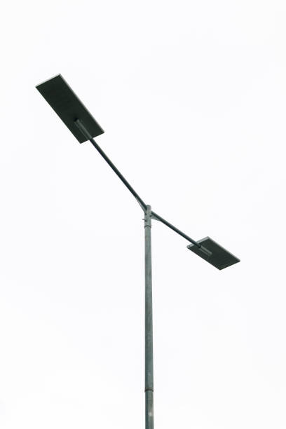 istock Street Light Pole with Double Rectangular Lamp Heads on a Cloudy Day Minimalist Scene 2195024669