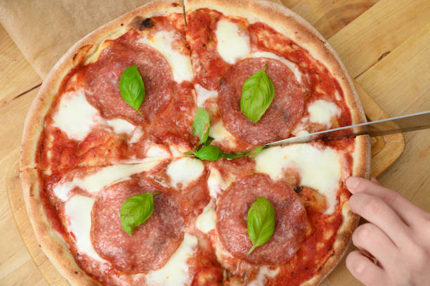 istock Hot crispy Italian pepperoni pizza with salami and mozzarella 2195028023