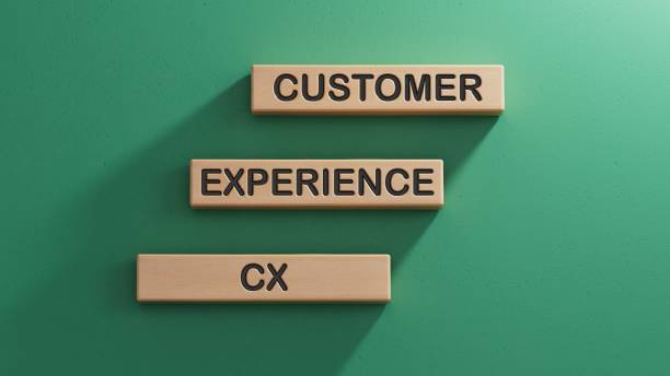 istock Customer Experience concept, cube wooden block with alphabet CX, important of user centric in recent world business, product.3D rendering on green background. 2195030595