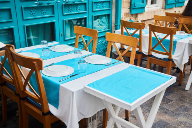 istock A table and chairs in an outdoor cafe. Mediterranean style. 2195032787