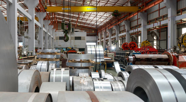 istock An industrial setting filled with neatly Steel sheet roll stack, reflecting the industry's organized chaos. 2195032923