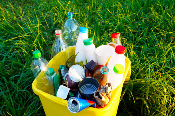 istock Plastic bottles in trash can. Waste container with plastic bottles. Bottles in Waste container. 2195036698