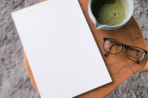istock blank magazine mockup on coffee table with green matcha tea 2195039441