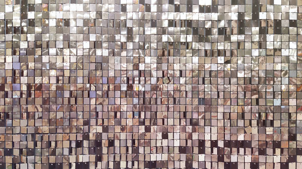istock Decorative wall with ornament of shiny mirror silver squares. 2195040122