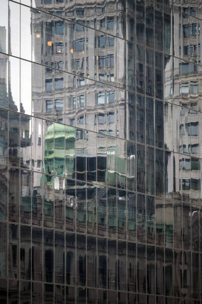 istock Old high towers reflection in glass high tower 2195042307
