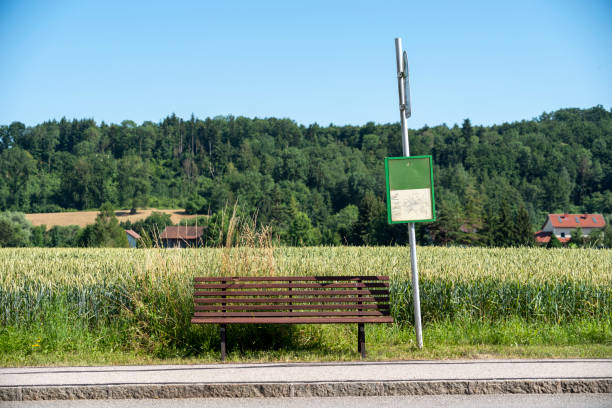 The development of rural bus routes and infrastructure, including simple shelters and benches, became more common in the 20th century as personal car ownership remained limited and public transportation was essential for connecting smaller communities. These bus stops facilitated access to employment, education, and services for those living outside of urban centers, playing a significant role in rural social and economic life.