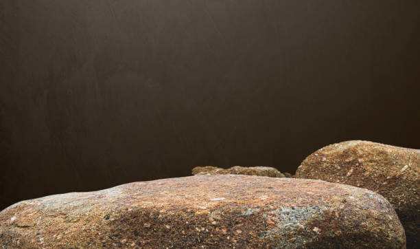istock Rock, Stone podium stand display advertising product, Production show with studio dark light wall room background well free space for text, Cliff rock stone stage, Clipping paths 2195045037