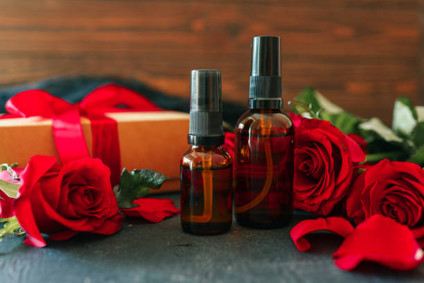 istock Gift box and cosmetic set with rose petals 2195050051