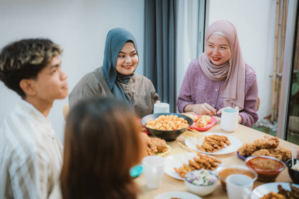 istock Savoring Eid: Muslim Asian Friends Share a Raya Feast 2195051181