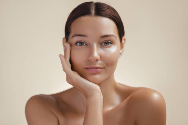 istock Woman with Clear Skin Posing Thoughtfully 2195051304
