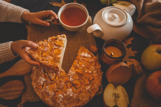 istock Apple pie and a cup of tea, cozy autumn 2195052386