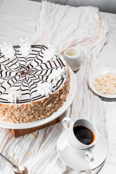 istock Esterhazy cake, traditional Hungarian, German cake, cake with almonds and condensed milk, walnut cake, cream cake, coffee cake on a light background, flatlay, still life, food photo dessert 2195053671