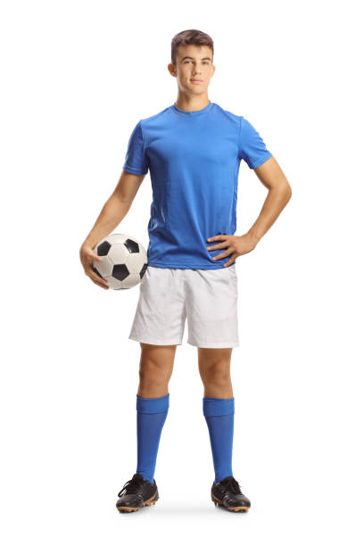 istock Young football player posing with a ball 2195055252