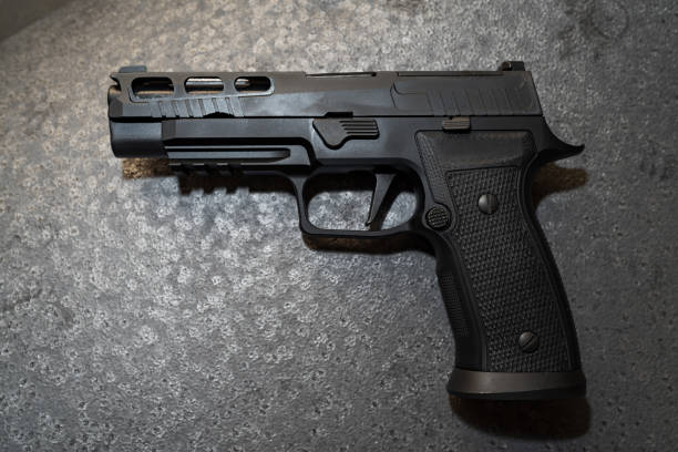 istock Tactical modern 9mm pistol with slots in the slide. 2195057094