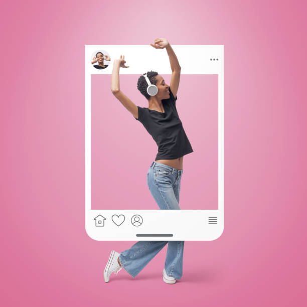 istock Beautiful woman dancing and sharing a social media post 2195062206