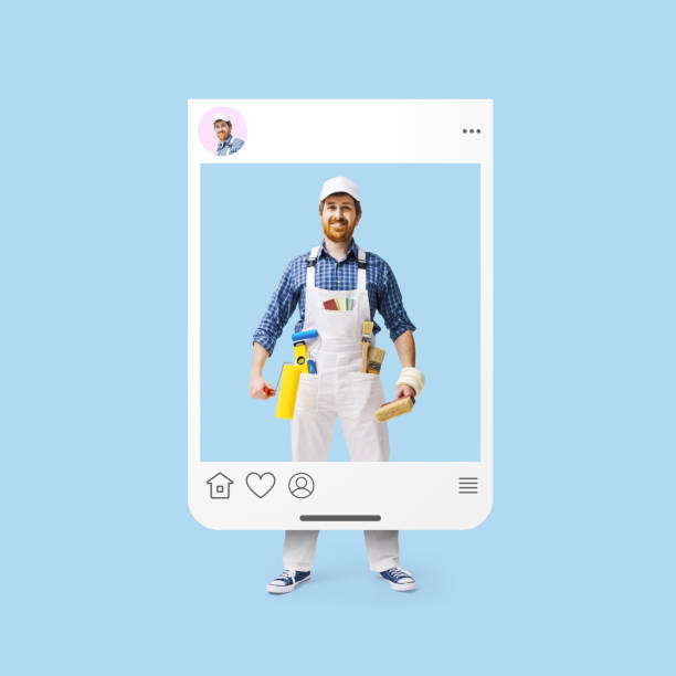 istock Professional house painter sharing a social media post 2195062512