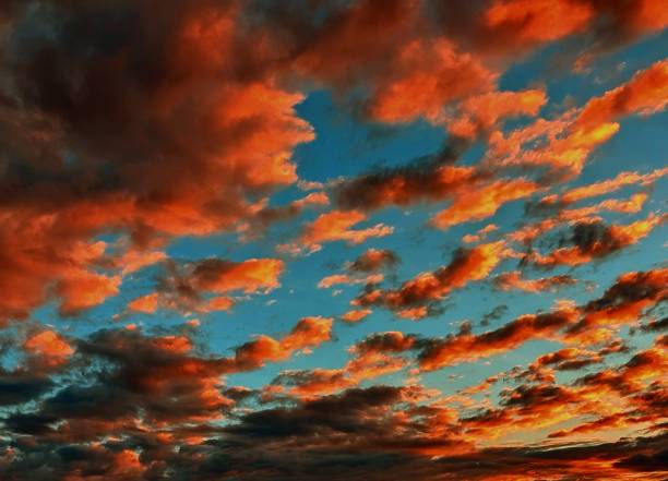 istock Radiant Sky Coloring the Clouds 2195067145
