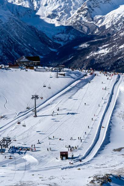 istock Skiers in Dombay mountains 2195067692
