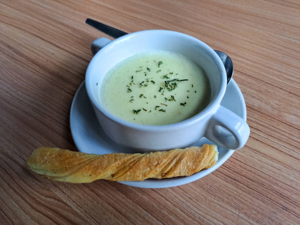 Delicious Potato Cream Soup With Baguette In Bowl. Food Menu.
