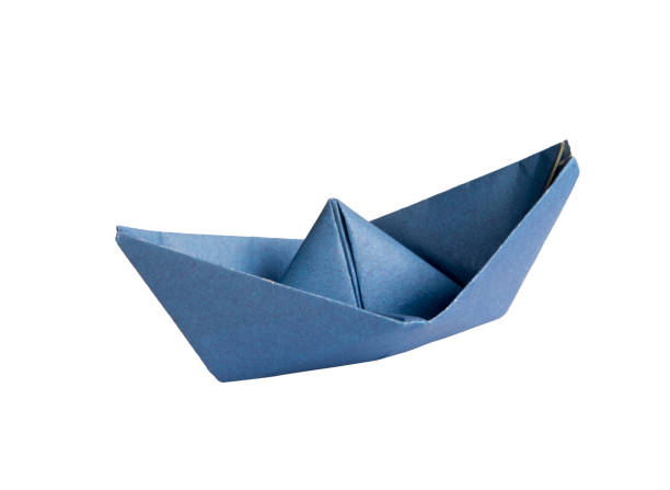 istock Blue paper boat on a white isolated background 2195069869